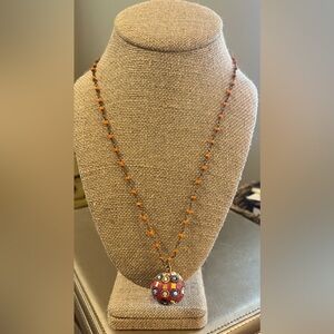 26” Long Bali inspired beaded prism necklace. Orange, brushed gold/antiqued